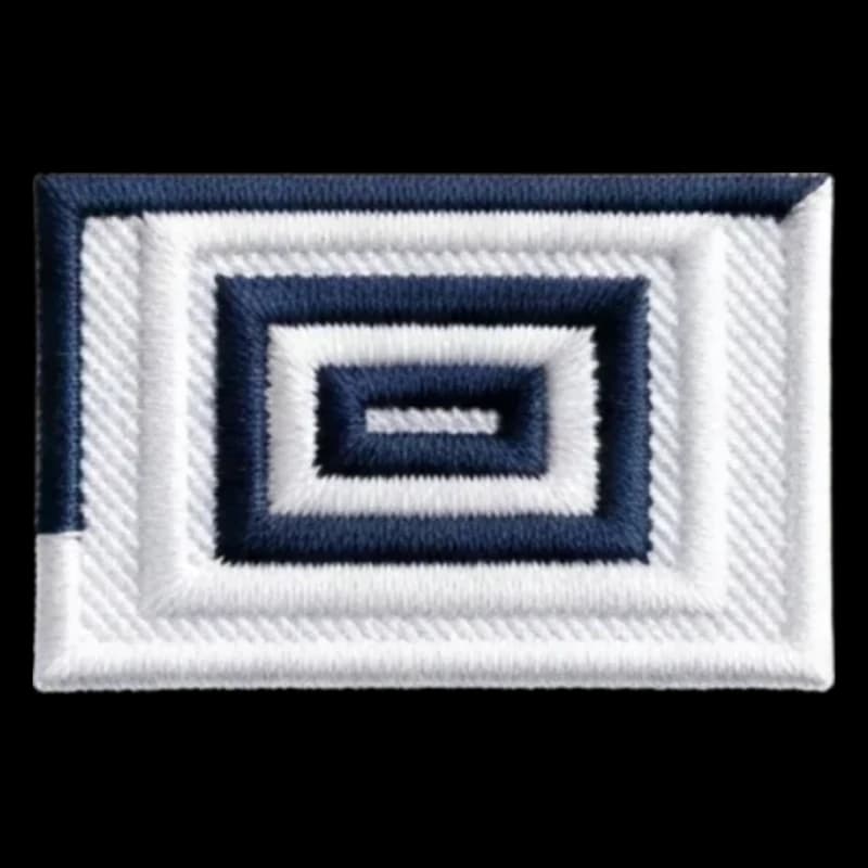 Écusson brodé d'un logo d'entreprise, aussi appelé patch ou badge