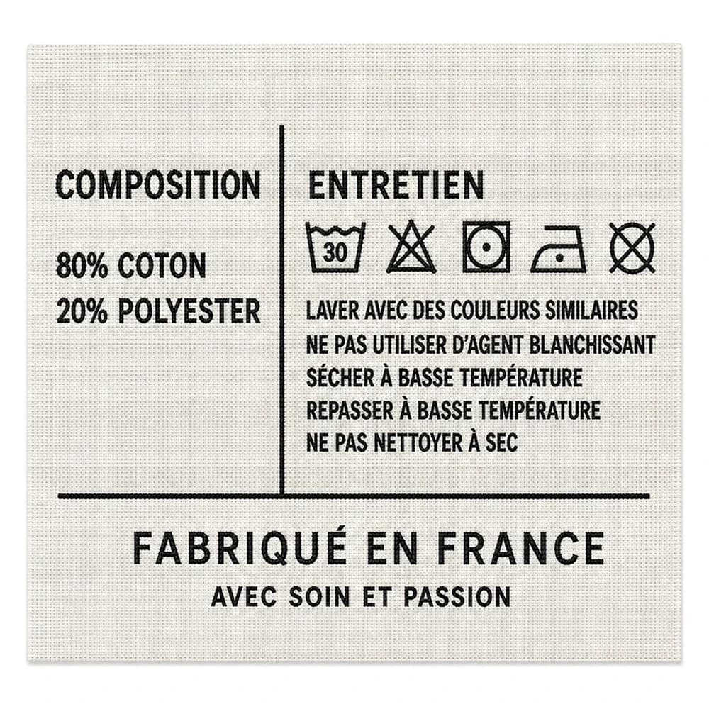 Étiquette tissée de composition textile, consignes d'entretien et mention Fabriqué en France